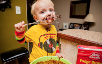 Logan bakes brownies